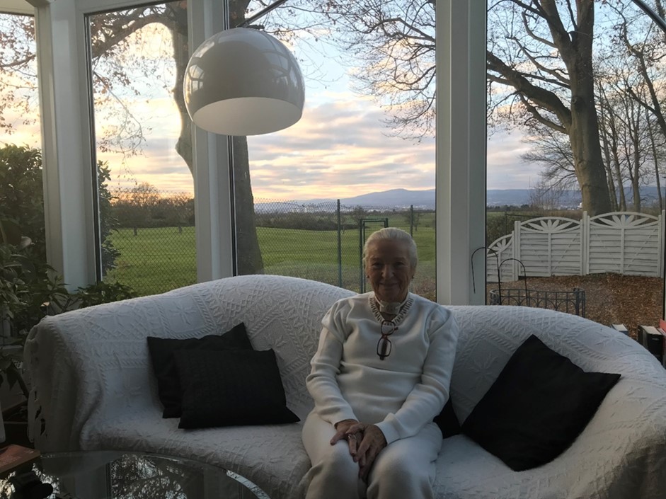 An interview with Mrs. Edeltraud Stegemann sitting in a white couch with beautiful view behind