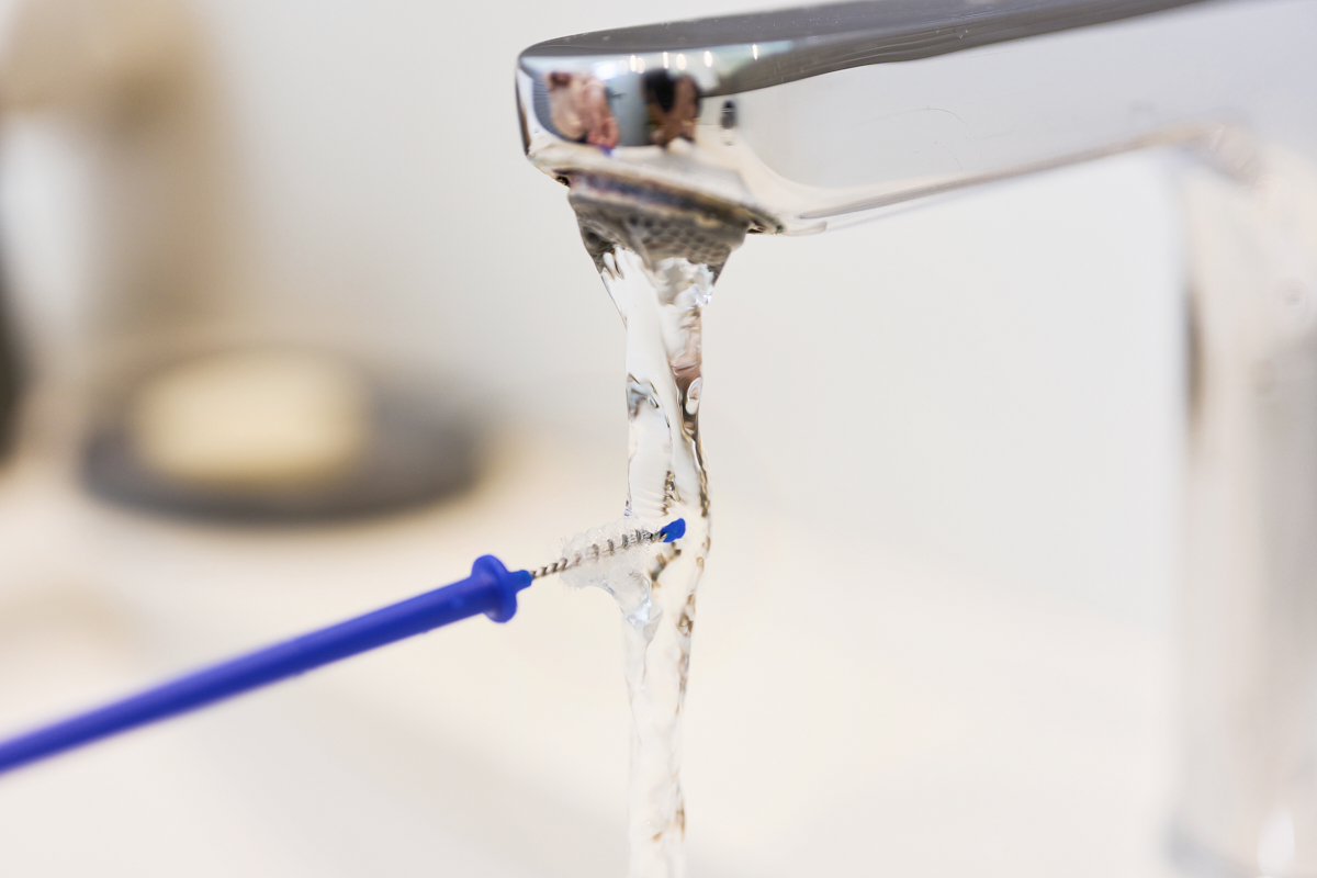 woman cleaning stoma maintenance